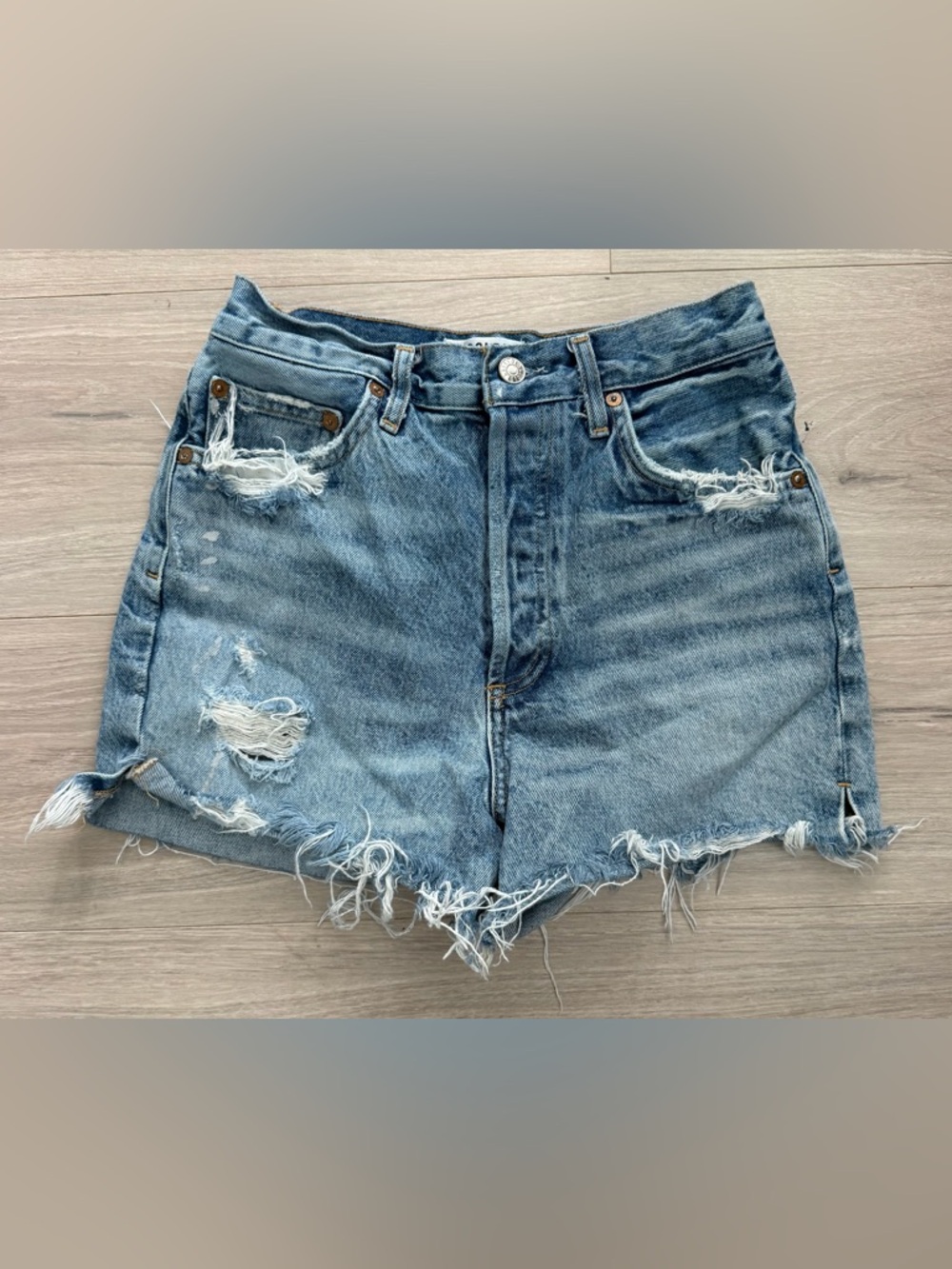 Agolde Distressed Light Blue Denim Shorts